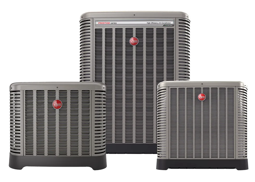 Three Rheem outdoor heat pump units in different sizes